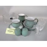 A collection of Denby table wares with pale green glazed finish including a pair of jugs, pair of