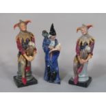 Two Royal Doulton figures of The Jester HN2016, together with a further Royal Doulton figure of