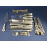 A large collection of white metal and silver flatware, comprising a set of 14 German white metal