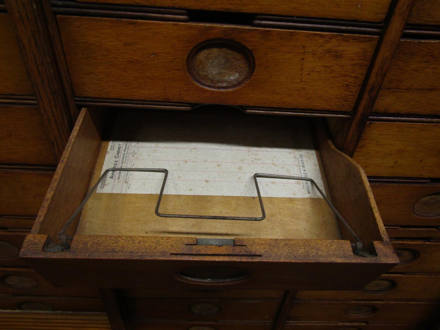 An early 20th century oak floorstanding filing cabinet fitted with a segmented tower arrangement - Image 3 of 5