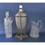 Good quality cut glass and silver plated table lamp, on a quatrefoil plateau with paw feet, 36 cm