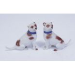 Two Meissen porcelain hounds, each with blue collars, 5 cm in height