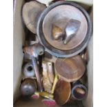 An antique treen lot comprising, bowls, mallets, sporting rattle, glove stretchers, etc