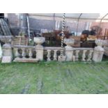 A weathered composition stone sectional balustrade (run), comprising four square cut and foliate