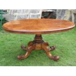 A Victorian walnut figured and burr walnut veneered oval tilt top breakfast table with moulded