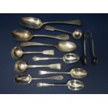 A collection of ten antique silver mainly teaspoons, together with a pair of sugar nips, 6 ozs