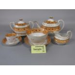 A quantity of Victorian tea wares with gilt leaf decoration on a peach coloured border comprising