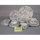 A collection of Minton Haddon Hall pattern wares comprising ten dinner plates, ten dessert plates,