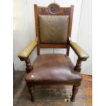 A Victorian oak elbow chair with carved detail, together with two matching Victorian mahogany framed