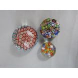 Three millefiori paperweights, the largest 7.6cm diameter (3)