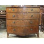 A Regency mahogany bow front bedroom chest of four long graduated drawers with well matched flame