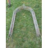 A galvanised steel rose arch/arbour with decorative lattice and scroll detail, 265 high x 120cm wide