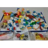 Collection of 18 collectable Smurfs and 12 Magic Roundabout figures