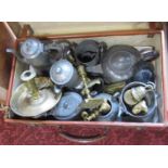 A suitcase containing a collection of mixed metalware to include mainly planished pewter in the