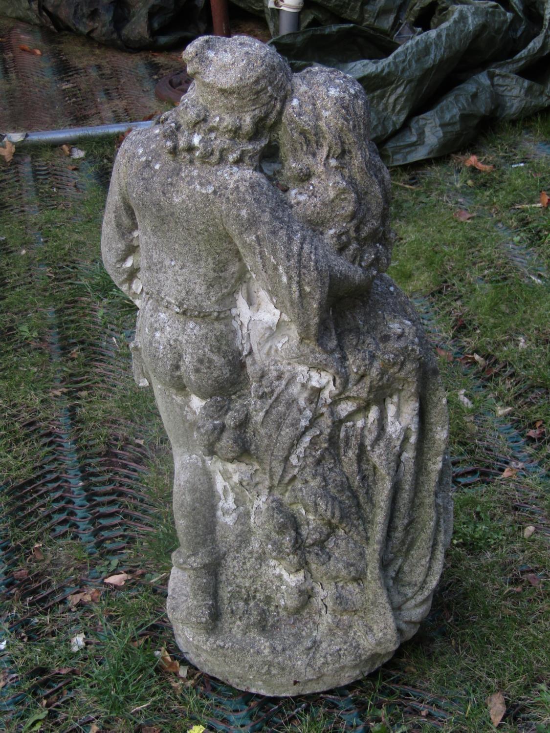 A weathered cast composition stone garden figure group in the form of a romantic couple, 70 cm high, - Image 2 of 4