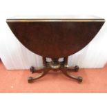An unusual Victorian walnut and figured walnut drop leaf tea table, with gateleg action, raised on a