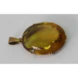 9ct faceted citrine pendant, the large oval stone measuring 3.2 x 2.4cm approx, 15.4g