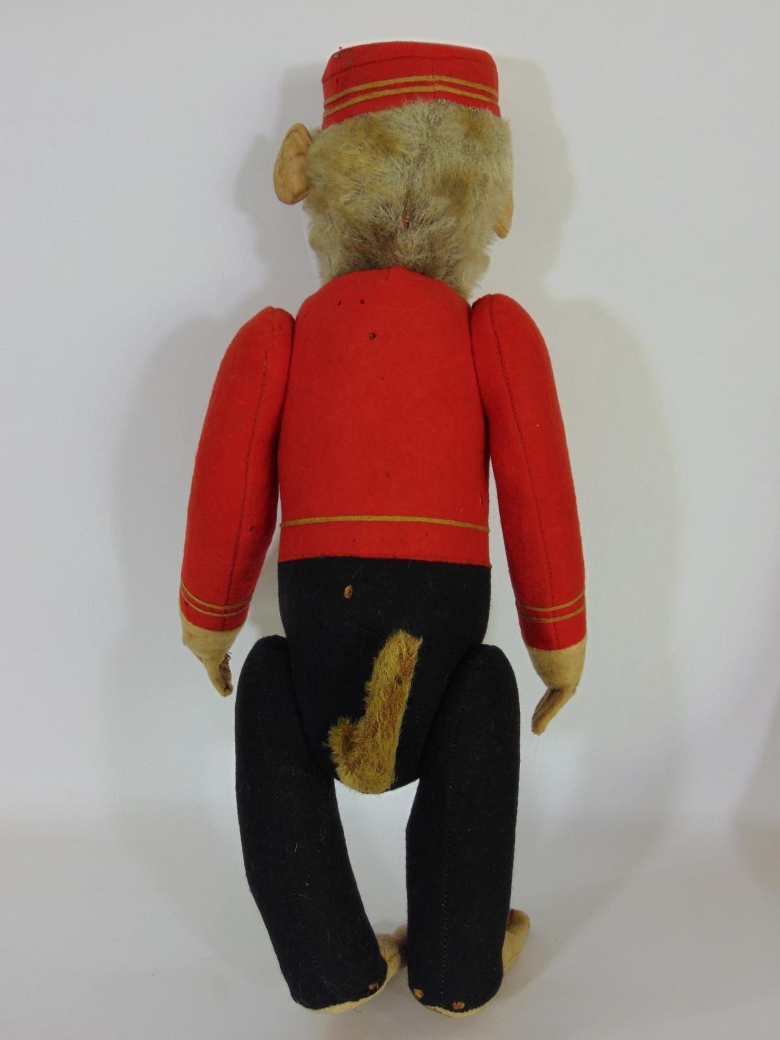 Schucco Bellhop Yes/ No monkey C1920's with brown glass eyes, fur head, felt face, in red and - Image 3 of 11