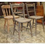 Three Victorian Windsor stained elm and beechwood bar back kitchen chairs, together with one