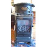A Provence portable cast metal framed gas bottle heater in the form of a mock stove