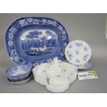 A collection of 19th century and later blue and white printed wares including two oval graduated