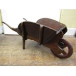 A charming 19th century child's wheelbarrow of traditional English form, with original painted