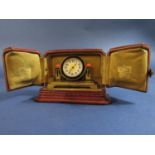 Fine Cartier boudoir/cabinet clock, the brass case with inset black enamel, the dial with gilt
