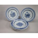 A set of three 19th century oriental blue and white dishes with painted flower basket decoration