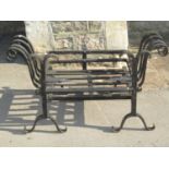 A cast and wrought iron fire basket of rectangular form with scroll detail, 90 cm x 52 cm (full
