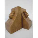 Pair of Robert Mouseman Thompson carved oak bookends with typical mouse decoration and scalloped