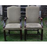 A pair of Gainsborough style open armchairs with upholstered seats and back, swept and moulded