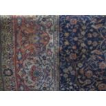 Axminster type carpet with various foliage upon a fawn and blue ground, 360 x 320