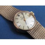 Vintage ladies Omega Automatic dress watch, champagne dial with baton markers, subsidiary second
