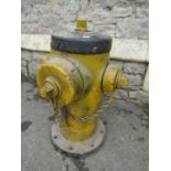 A reclaimed Mueller heavy cast iron fire hydrant with painted finish
