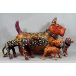 Four highly decorative models of dogs, papier mache, timber and beadwork, decoupage finish, 35 cm in