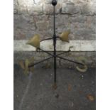 An ironwork weather vane with painted gilt highlighted metal letters and copper arrow head pointer