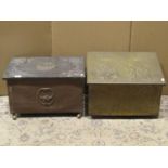 Two embossed fireside boxes, of varying design and decoration, one copper clad, the other brass