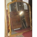 A Victorian overmantle mirror of arched form with simulated naturalistic twig frame with over gilt