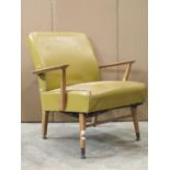 A mid 20th century open elbow chair with stained beechwood frame, faux green leather upholstered