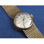 Vintage ladies Omega Ladymatic dress watch, the champagne dial with baton markers and date aperture,