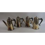 Set of four tapered silver plated Georgian style coffee pots engraved with the royal monogram,