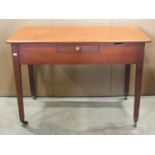 An unusual 19th century mahogany low centre table of rectangular form, each side fitted with a small