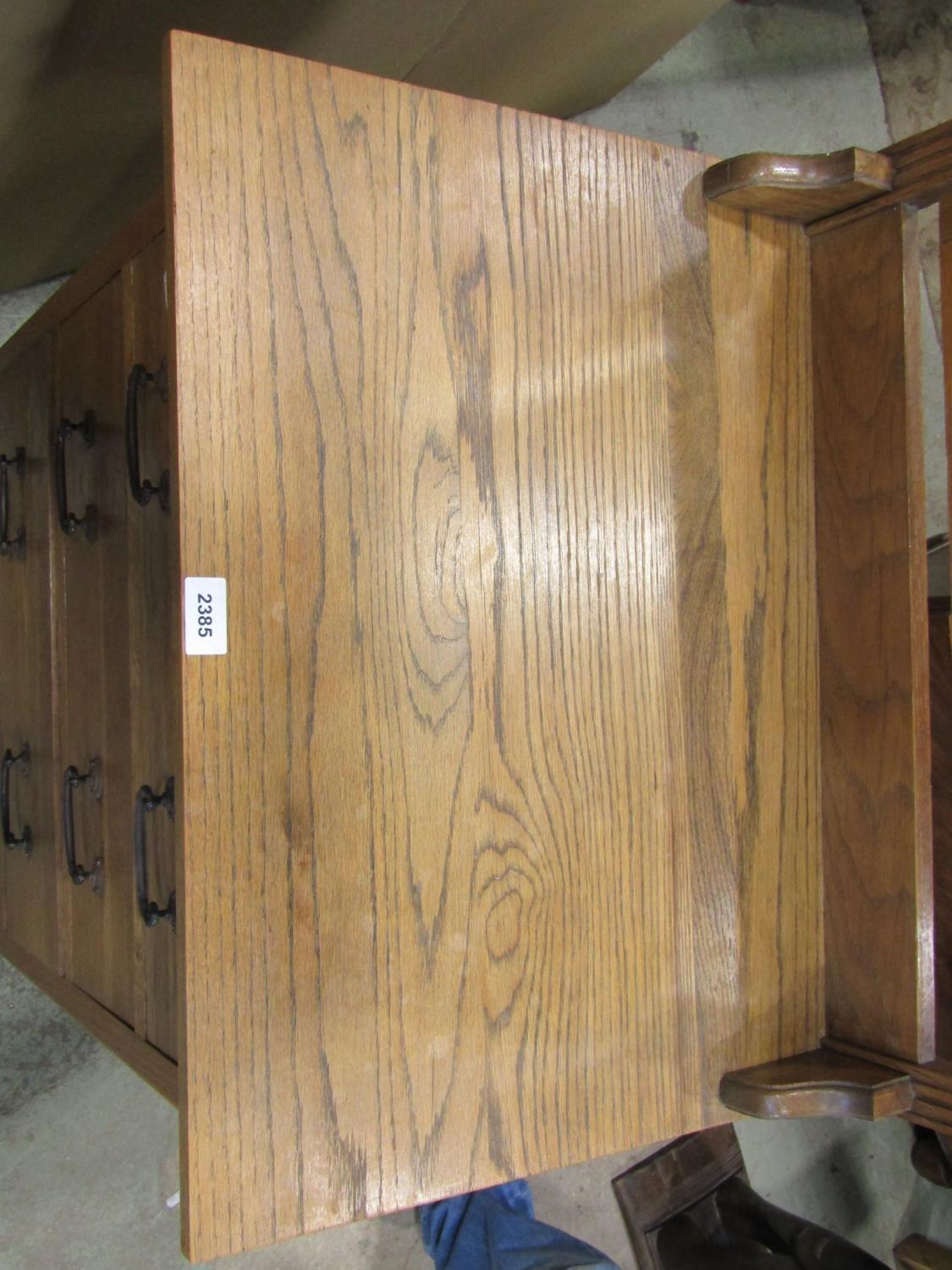 A small Edwardian/1920s stripped oak dressing chest of four long drawers, beneath a rectangular - Image 3 of 3