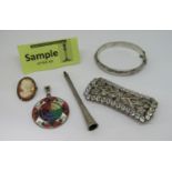 Mixed lot of costume jewellery to include a paste set buckle (af), silver; cigarette holder,