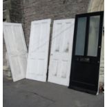 Two similar reclaimed 19th century painted pine four panelled internal doors, a further contemporary