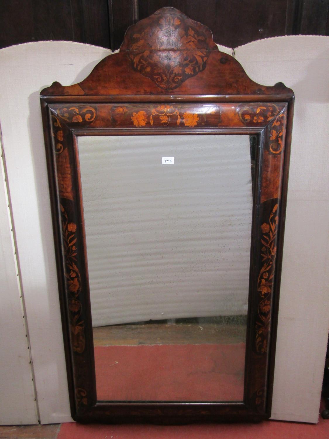 A 19th century Dutch floral marquetry mirror, the cushion moulded frame of rectangular form set