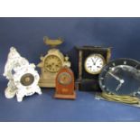A mixed collection of mantel clocks to include an alabaster clock, a black slate mantel clock, two