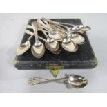 Matched set of 20 novelty golfing teaspoons, with crossed clubs and ball to the trefoil shank, maker