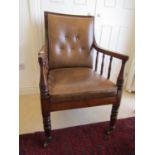 A good quality 19th century library or drawing room chair with turned spindle mouldings, recently