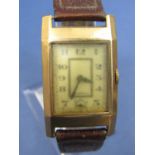1940s gent's yellow metal dress watch the rectangular dial with Arabic numerals and subsidiary